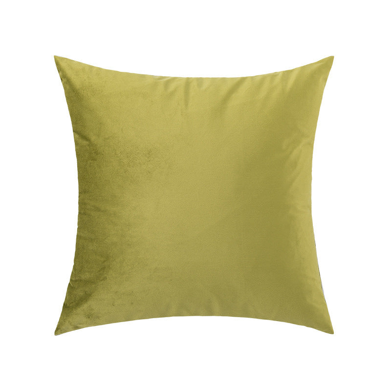 Green pillow on a white background