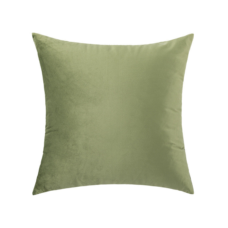 Green pillow on a white background