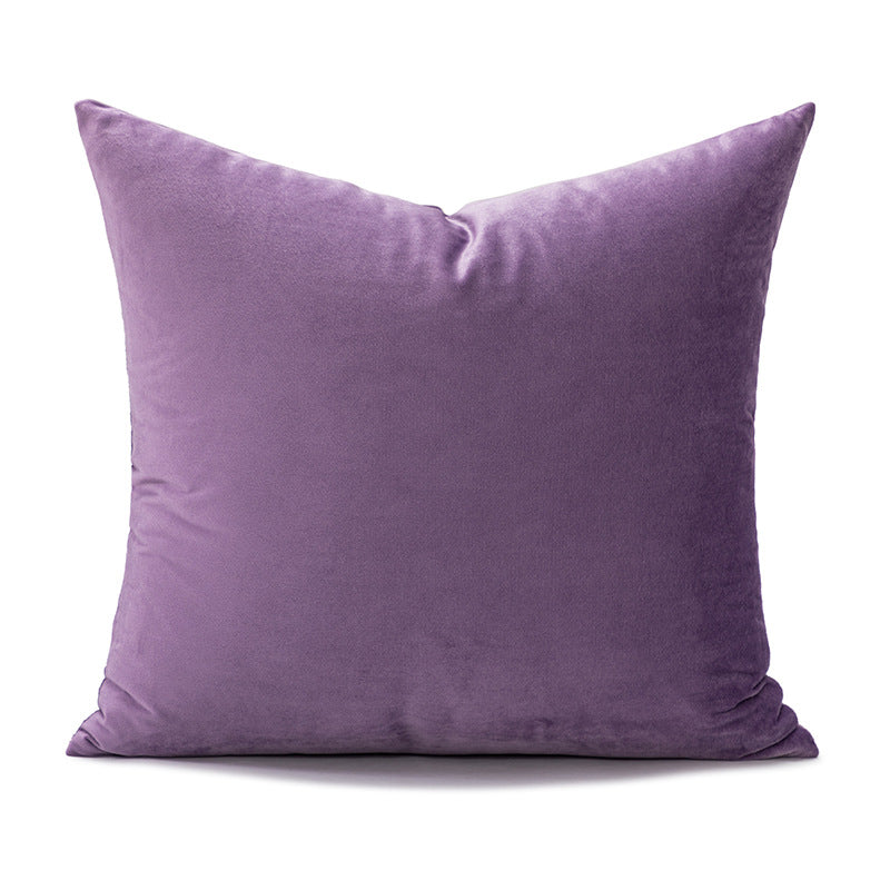 Purple pillow on a white background