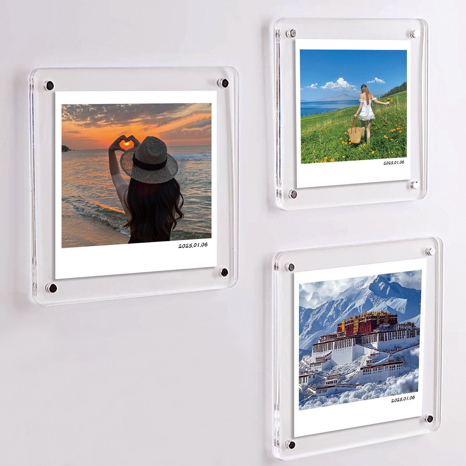 Three transparent polaroid photo frames displaying scenic images on a white wall.