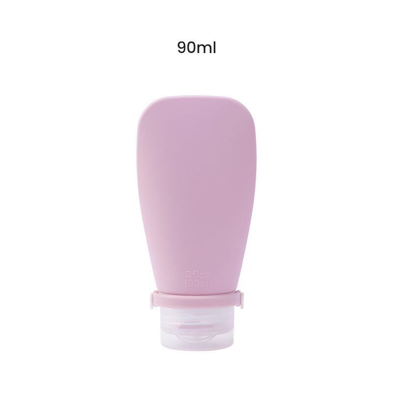 Pink silicone travel bottle with '90ml' text on a white background